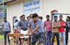 Actor Shivarajkumar seen playing Cricket during his visit to Kukke Subramanya